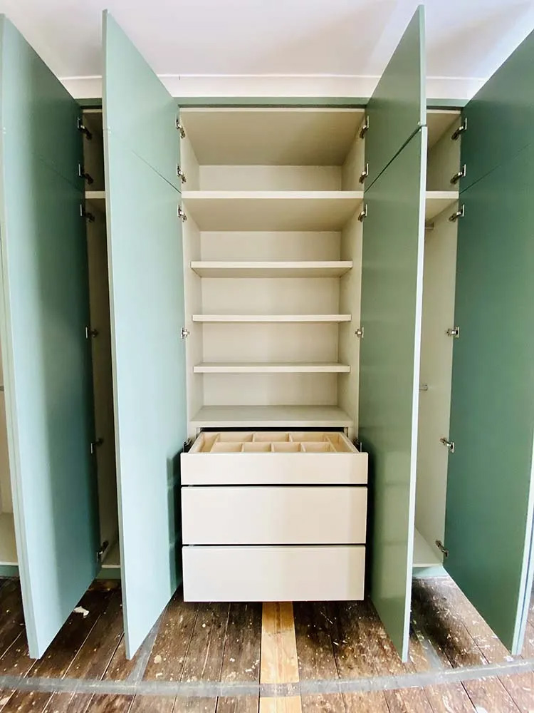 Gallery - Fitted Green Wardrobe Open - James Hewitt Furniture By Design